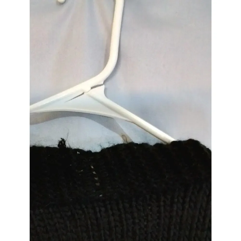 Forever 21 black sweater with red mushrooms.